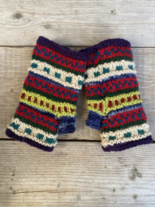 Handwarmers, vingerloze handschoenen of polswarmers. Handgebreid in Nepal en gevoerd met fleece voor super warme handen