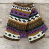 Handgebreide 100% wollen polswarmers gemaakt door vrouwen in Nepal. Met fleece gevoerd dus superwarm! Elk paar is uniek want handwerk.