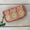Prachtige en unieke portemonnee met de hand afgewerkt met vintage stoffen uit India. Elke portemonnee is uniek en handmade.